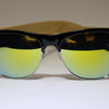 The Orca Bamboo Sunglasses - Happy Beluga - closeup - recycled plastic sunglasses