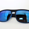 The Big Blue Bamboo Sunglasses - Happy Beluga - closeup - recycled plastic sunglasses